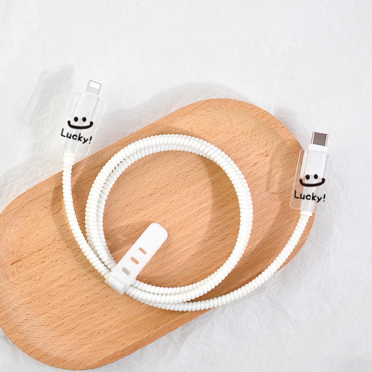 Verilux Charger Protectors for iPhone 15 and 14 featuring TPU Covers and Spring Coil Sleeve | Cute Smile Design